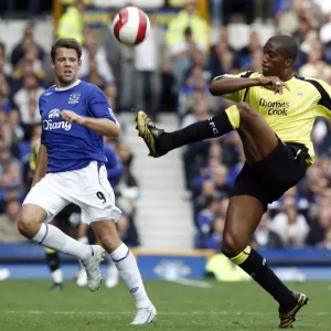 Everton v Manchester City James Beattie of Everton in action against Sylvain Distin of Manchester City Everton v Manchester City James Beattie of Everton in action against Sylvain Distin of Manchester City