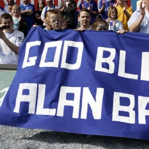 Everton v Manchester United Young Everton fans hold a banner to commemorate Alan Ball