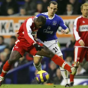 Everton v Middlesbrough George Boateng battles with Leon Osman