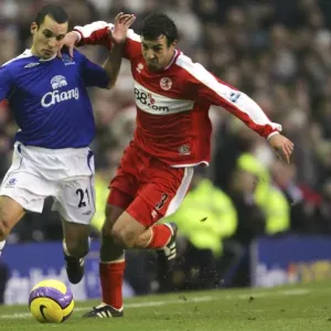 Everton v Middlesbrough Leon Osman battles with Julio Arca