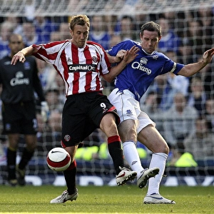 Everton v Sheffield United - 21 / 10 / 06 David Weir Everton and Rob Hulse - Sheffield United in action