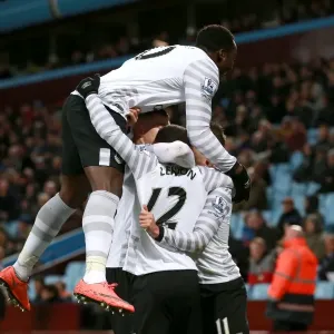 Everton's Aaron Lennon Celebrates Second Goal Amidst Ecstatic Team Mates in Intense Aston Villa vs Everton Barclays Premier League Clash Everton's Aaron Lennon Celebrates Second Goal Amidst Ecstatic Team Mates in Intense Aston Villa vs Everton Barclays Premier League Clash
