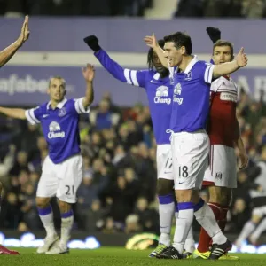 Everton's Barry and Jagielka: Celebrating a Triumphant Third Goal Against Fulham (14-12-2013) Everton's Barry and Jagielka: Celebrating a Triumphant Third Goal Against Fulham (14-12-2013)