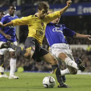 Evertons Carsley challenges Arsenals Flamini for the ball during their English League Cup fourth r Evertons Carsley challenges Arsenals Flamini for the ball during their English League Cup fourth r