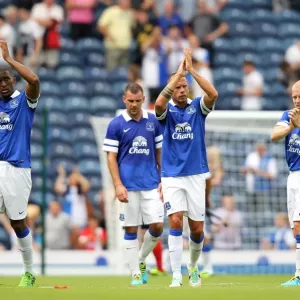 Everton's Distin, Heitinga, and Naismith Celebrate Pre-Season Victory Over Blackburn Rovers