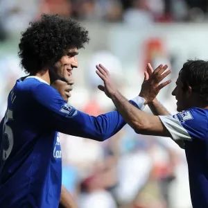 Everton's Fellaini and Baines: Celebrating a Goal in Swansea City's 0-3 Defeat (Premier League, September 22, 2012) Everton's Fellaini and Baines: Celebrating a Goal in Swansea City's 0-3 Defeat (Premier League, September 22, 2012)