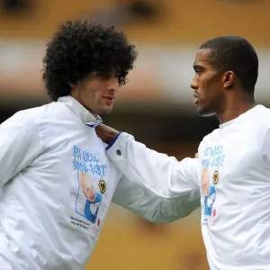 Everton's Fellaini and Distin Unite Before Kick-off vs. Wolverhampton Wanderers (May 2012) Everton's Fellaini and Distin Unite Before Kick-off vs. Wolverhampton Wanderers (May 2012)
