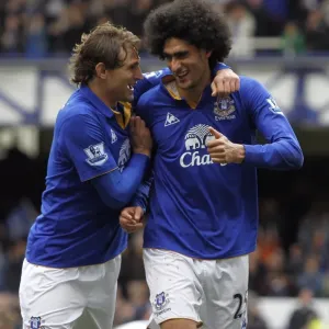 Everton's Fellaini and Jelavic: A Dynamic Duo Celebrates Their Second Goal vs. Fulham (April 2012, Goodison Park) Everton's Fellaini and Jelavic: A Dynamic Duo Celebrates Their Second Goal vs. Fulham (April 2012, Goodison Park)