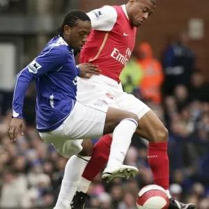 Evertons Fernandes challenges Arsenals Baptista for the ball during their English Premier League s