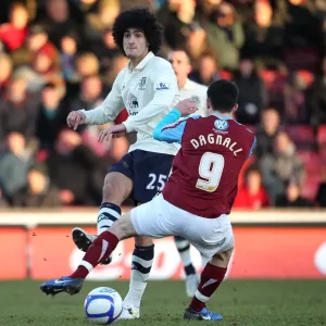 Everton's Fierce Battle: Marouane Fellaini vs. Chris Dagnall at Glanford Park, FA Cup Third Round Everton's Fierce Battle: Marouane Fellaini vs. Chris Dagnall at Glanford Park, FA Cup Third Round