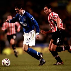 Everton's Francis Jeffers Slips Past Exeter City's Chris Curran in FA Cup Third Round Replay Thriller