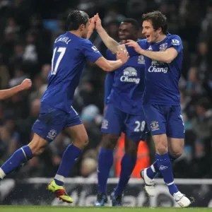 Everton's Glorious Moment: Tim Cahill and Leighton Baines Celebrate Their Goals Against Manchester City (2010) Everton's Glorious Moment: Tim Cahill and Leighton Baines Celebrate Their Goals Against Manchester City (2010)