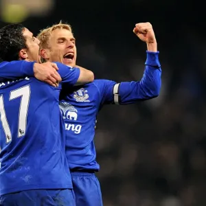 Everton's Glory: Tim Cahill and Phil Neville's Victory Celebration over Manchester City (2010) Everton's Glory: Tim Cahill and Phil Neville's Victory Celebration over Manchester City (2010)