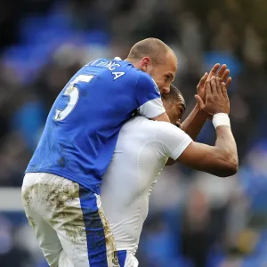 Everton's Heitinga and Distin: Celebrating Victory Over Manchester City at Goodison Park (16-03-2013) Everton's Heitinga and Distin: Celebrating Victory Over Manchester City at Goodison Park (16-03-2013)