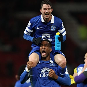 Everton's Historic Victory: Oviedo and Distin Celebrate Over Manchester United (0-1)