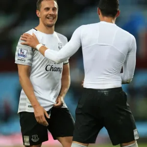 Everton's Jagielka and Funes Mori: Victory Celebration vs. Aston Villa in Premier League Everton's Jagielka and Funes Mori: Victory Celebration vs. Aston Villa in Premier League