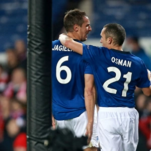 Everton's Jagielka and Osman Celebrate Second Goal in Europa League Match vs. Lille