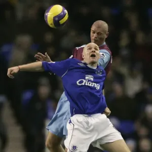 Evertons Johnson challenges West Ham Uniteds Konchesky for the ball during their English Premier L Evertons Johnson challenges West Ham Uniteds Konchesky for the ball during their English Premier L