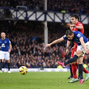 Everton's Leighton Baines Unleashes a Powerful Shot vs Leicester City at Goodison Park