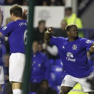 Everton's Louis Saha: Double Delight as He Celebrates Second Goal Against Fulham at Goodison Park (BPL 2011) Everton's Louis Saha: Double Delight as He Celebrates Second Goal Against Fulham at Goodison Park (BPL 2011)