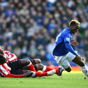Everton's Louis Saha Foul by Sunderland's Titus Bramble and John Mensah (Barclays Premier League, 26 February 2011, Goodison Park) Everton's Louis Saha Foul by Sunderland's Titus Bramble and John Mensah (Barclays Premier League, 26 February 2011, Goodison Park)