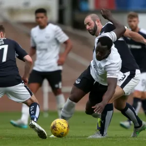 Everton's Lukaku Tackled by Harkins in Pre-Season Clash at Dens Park Everton's Lukaku Tackled by Harkins in Pre-Season Clash at Dens Park
