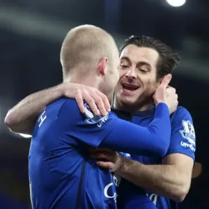 Everton's Naismith and Baines: A Celebratory Moment as They Secure the Third Goal Against Queens Park Rangers Everton's Naismith and Baines: A Celebratory Moment as They Secure the Third Goal Against Queens Park Rangers