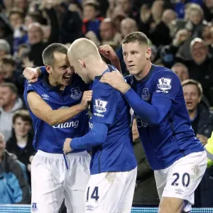 Everton's Osman, Naismith, and Barkley: Triumphant Trio Celebrates Second Goal vs. West Ham