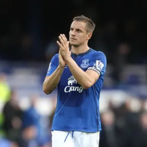 Everton's Phil Jagielka: A Heartfelt Celebration with Fans after Securing a Hard-Fought Victory vs. Aston Villa (BPL) Everton's Phil Jagielka: A Heartfelt Celebration with Fans after Securing a Hard-Fought Victory vs. Aston Villa (BPL)