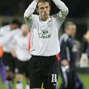 Everton's Phil Neville Celebrates with Fans after UEFA Cup Match vs Fiorentina (2008)