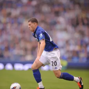 Everton's Ross Barkley in Action: Premier League Clash at Goodison Park (Everton vs. Queens Park Rangers, 2011) Everton's Ross Barkley in Action: Premier League Clash at Goodison Park (Everton vs. Queens Park Rangers, 2011)