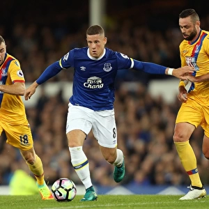 Everton's Ross Barkley Clashes with McArthur and Delaney of Crystal Palace at Goodison Park