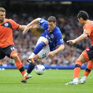 Everton's Ross Barkley Faces Off Against Faurlin and Buzsaky of QPR in Intense Premier League Clash (2011) Everton's Ross Barkley Faces Off Against Faurlin and Buzsaky of QPR in Intense Premier League Clash (2011)