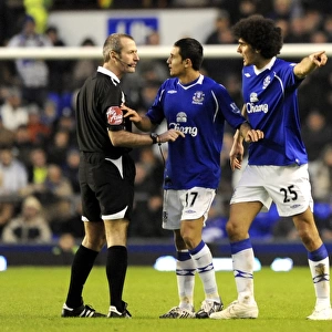 Everton's Tim Cahill and Marouane Fellaini Go Head-to-Head Against Hull City and Referee Martin Atkinson in the Barclays Premier League, 2009