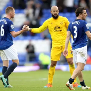 Everton's Tim Howard and James McCarthy: Celebrating a Hard-Fought Premier League Victory Over Aston Villa at Goodison Park Everton's Tim Howard and James McCarthy: Celebrating a Hard-Fought Premier League Victory Over Aston Villa at Goodison Park