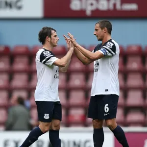 Everton's Triumph: Baines and Jagielka's Jubilant Moment at Upton Park after Everton's 3-2 Victory over West Ham United (September 21, 2013, Barclays Premier League) Everton's Triumph: Baines and Jagielka's Jubilant Moment at Upton Park after Everton's 3-2 Victory over West Ham United (September 21, 2013, Barclays Premier League)