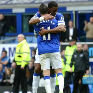 Everton's Triumph: Mirallas and Distin's Embrace - Everton's 3-0 Victory Over Arsenal (Barclays Premier League, Goodison Park, 06-04-2014) Everton's Triumph: Mirallas and Distin's Embrace - Everton's 3-0 Victory Over Arsenal (Barclays Premier League, Goodison Park, 06-04-2014)