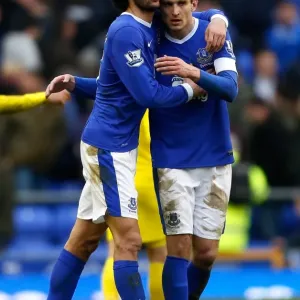 Everton FC Print: Fellaini and Jelavic's Embrace (March 2, 2013) Everton FC Print: Fellaini and Jelavic's Embrace (March 2, 2013)