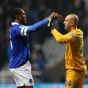 Everton's Triumph: Howard and Distin Celebrate Historic 3-0 Victory Over Newcastle United (BPL, St. James Park - 25-03-2014)