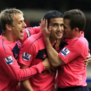 Everton's Triumphant Trio: Tim Cahill's Double Celebration with Baines and Neville, Birmingham City vs. Everton, Barclays Premier League Everton's Triumphant Trio: Tim Cahill's Double Celebration with Baines and Neville, Birmingham City vs. Everton, Barclays Premier League