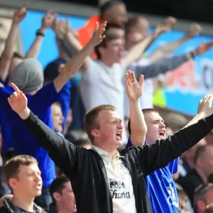 Everton's Unwavering Sea of Passion: A Roar from the Stands at Molineux (09.04.2011) Everton's Unwavering Sea of Passion: A Roar from the Stands at Molineux (09.04.2011)