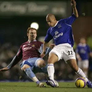 Evertons Vaughan challenges West Ham Uniteds Collins for the ball during their English Premier Lea Evertons Vaughan challenges West Ham Uniteds Collins for the ball during their English Premier Lea