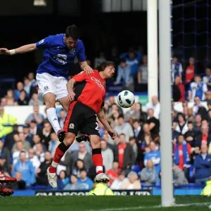 Everton's Vellios Goes for Glory: Thrilling Headed Attempt vs. Blackburn Rovers in Premier League (16 April 2011, Goodison Park) Everton's Vellios Goes for Glory: Thrilling Headed Attempt vs. Blackburn Rovers in Premier League (16 April 2011, Goodison Park)