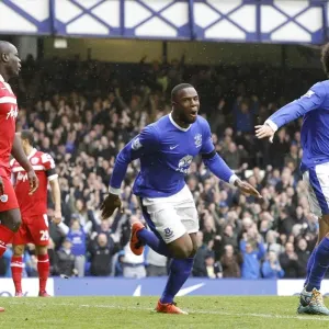 Everton's Victor Anichebe and Marouane Fellaini Celebrate as QPR's Christopher Samba Looks On - Everton 2-0 QPR (Goodison Park, 13-04-2013)