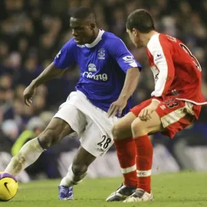 Everton's Victor Anichebe vs. Middlesbrough's Andrew Taylor: Intense Battle on the Football Field