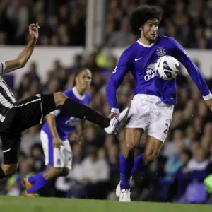 Fellaini Overcomes Gutierrez: Everton vs. Newcastle United, Barclays Premier League, September 17, 2012 Fellaini Overcomes Gutierrez: Everton vs. Newcastle United, Barclays Premier League, September 17, 2012