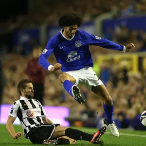 Fellaini vs. Cabaye: A Premier League Rivalry - Everton vs. Newcastle United's Battle for the Ball Fellaini vs. Cabaye: A Premier League Rivalry - Everton vs. Newcastle United's Battle for the Ball