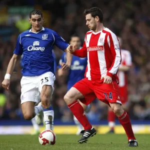 Print of Marouane Fellaini in action against Rory Delap at Goodison Park Print of Marouane Fellaini in action against Rory Delap at Goodison Park