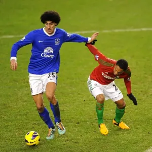 Fellaini vs. de Guzman: A Battle for Midfield Supremacy - Everton vs. Swansea City, Barclays Premier League (12-01-2013) Fellaini vs. de Guzman: A Battle for Midfield Supremacy - Everton vs. Swansea City, Barclays Premier League (12-01-2013)