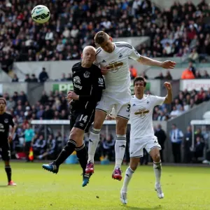 Fernandez vs. Naismith: A Battle of Determination in the Everton vs. Swansea City Premier League Clash at Liberty Stadium Fernandez vs. Naismith: A Battle of Determination in the Everton vs. Swansea City Premier League Clash at Liberty Stadium